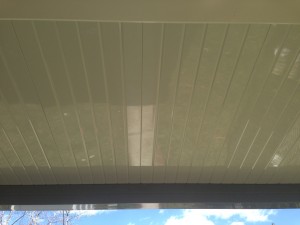 Light-colored ceiling makes the car port brighter.